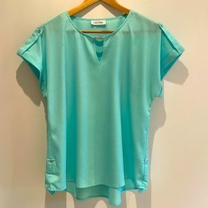 Calvin Klein Women’s Mint Green Blouse. Size M runs large.